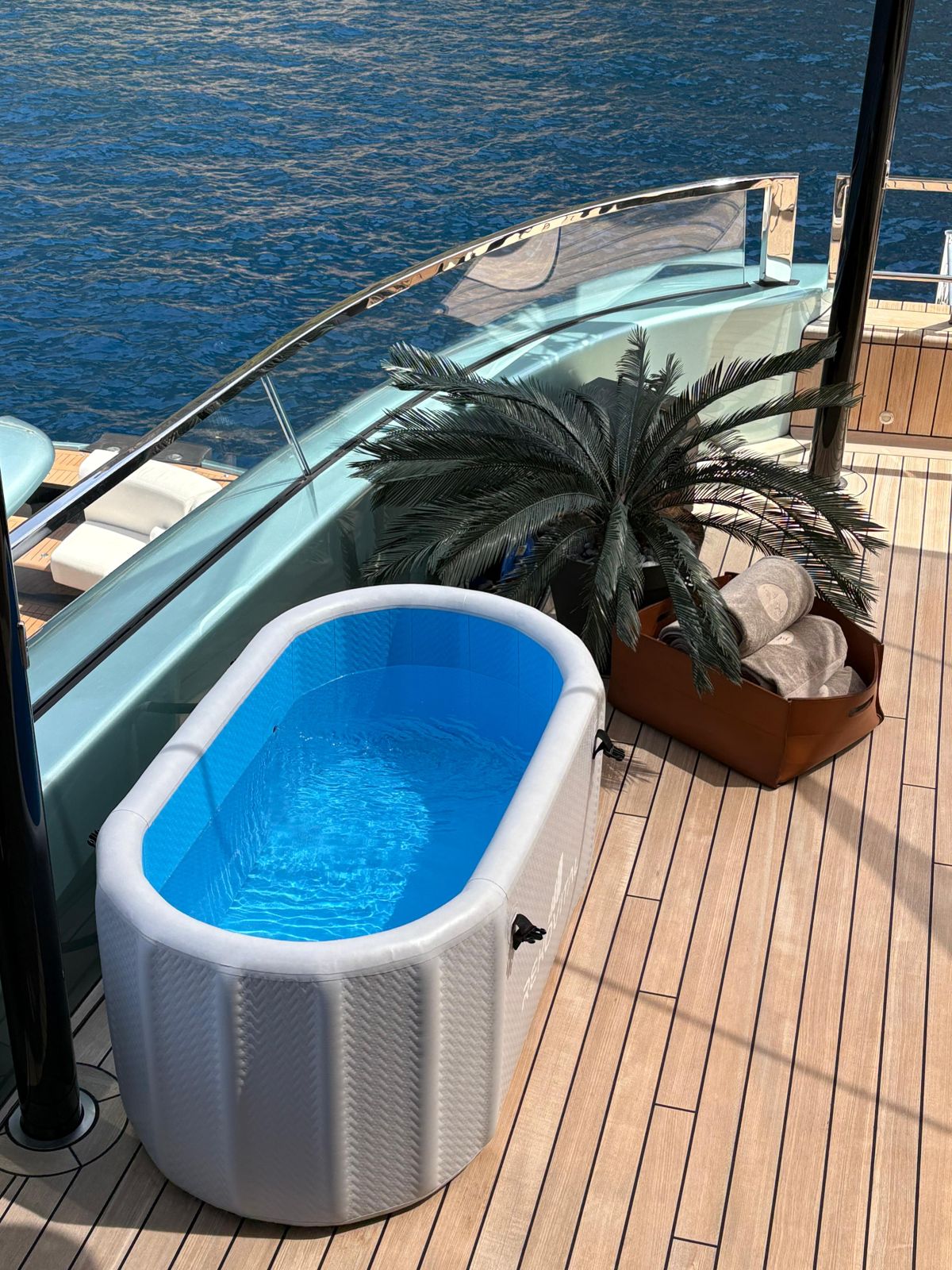 Cold plunge on a yacht deck